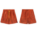 Rhude Orange Snake Print Nylon Shorts