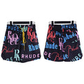 Rhude Black All‑Over Multicolor Logo Shorts