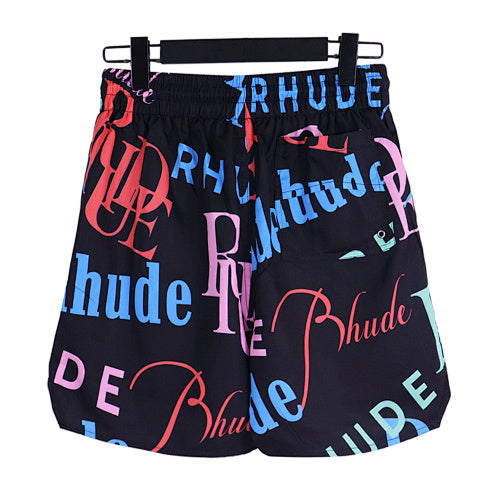 Rhude Black All‑Over Multicolor Logo Shorts