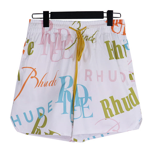 Rhude White All‑Over Multicolor Logo Shorts